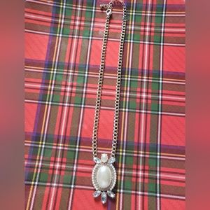 Gold tone metalchain necklace with faux pearl and faux crystal pendant